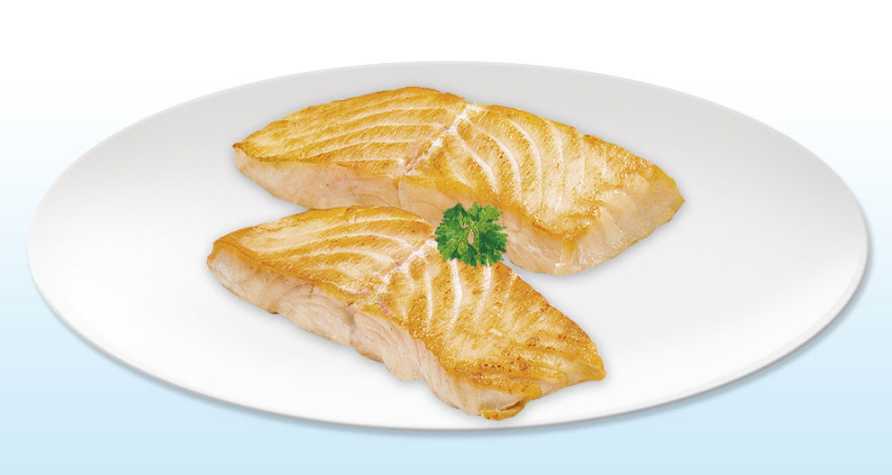 Two cooked salmon fillets on a white plate.